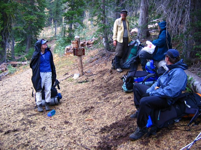 We had made the steep climb out of the valley floor.  
Now we just needed to continue another 1.5 miles to the basin below Emerald and Saska.
By this point, a few brief periods of heavier rain and had forced most of the group into their raingear and pack covers.